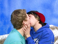 Young guys exchange kissing and cock blowing